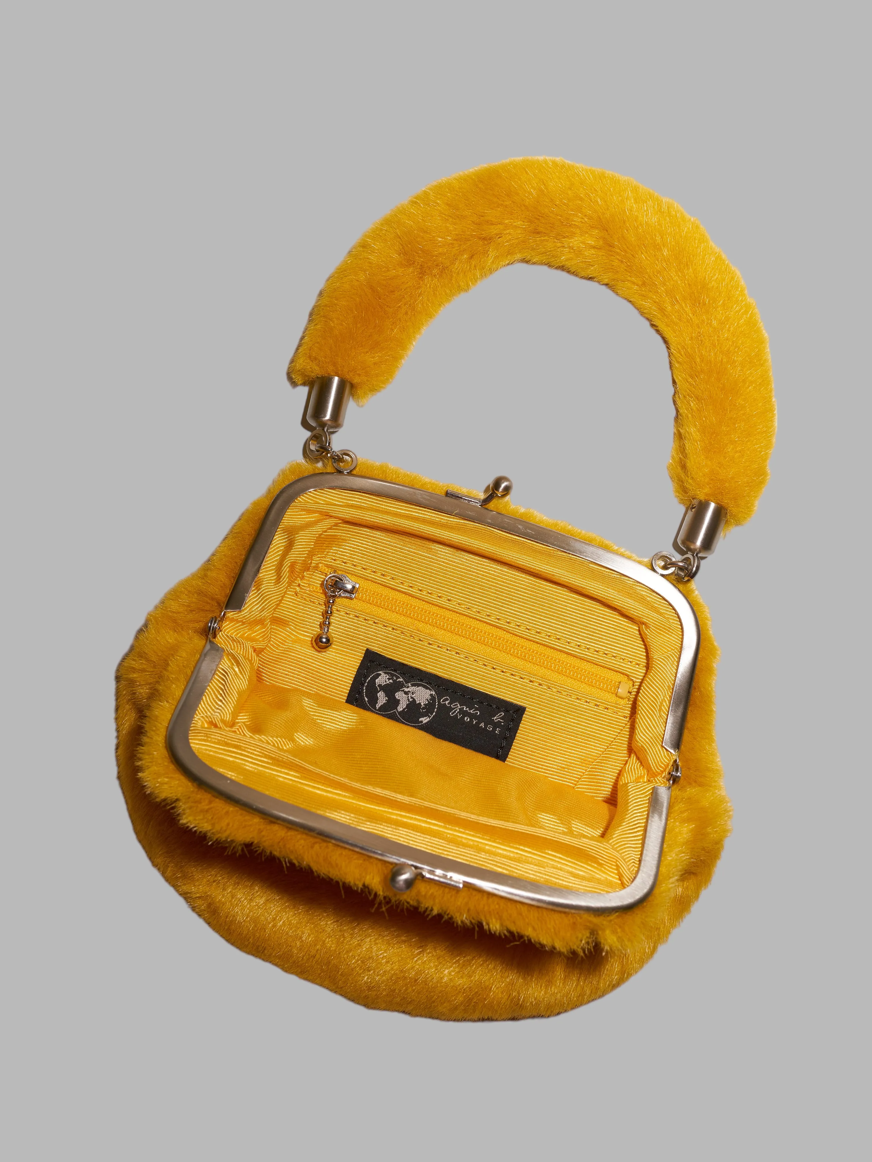 Agnes B Voyage yellow faux fur tiny handbag